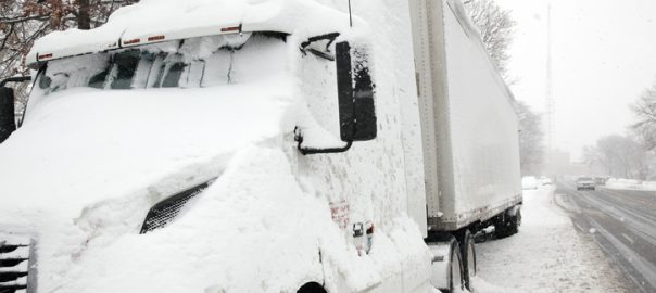 semi truck in winter storm